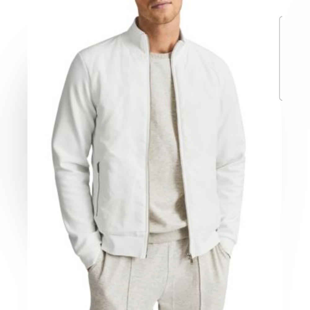 Men's light weight zip front jacket with 2 zip pockets. NWTs